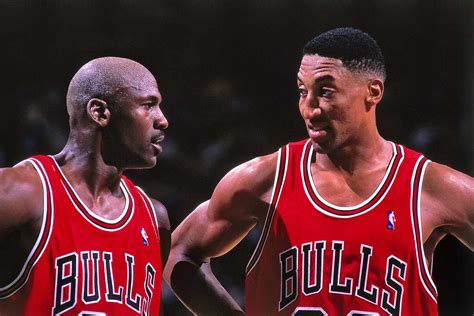 Bulls forward Scottie Pippen, right, assists teammate Michael Jordan off the court for a timeout against the Jazz during Game 5 of the NBA Finals on June 11, …